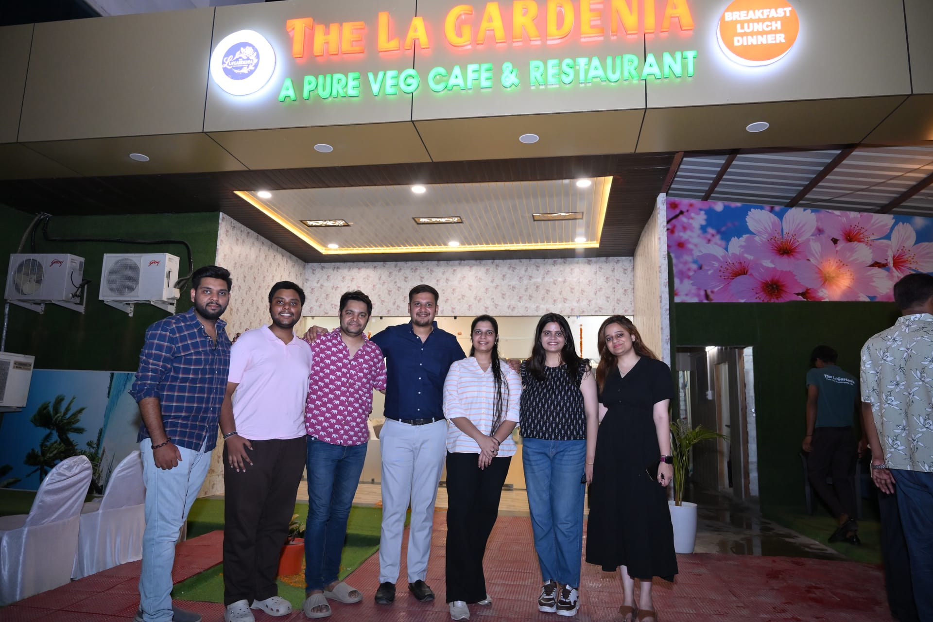 The La Gardenia sign lit up at night in Gomti Nagar